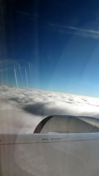 Clouds throughout the flight, here just before landing