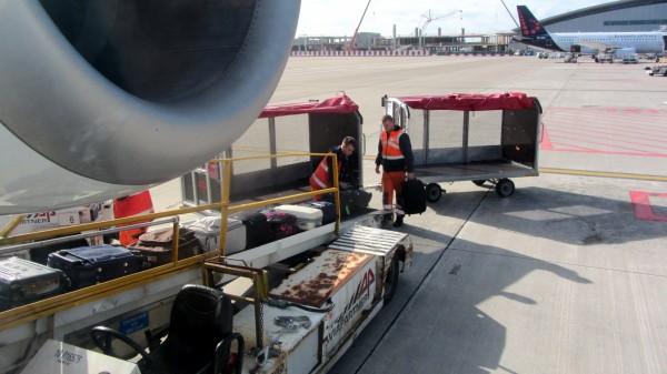 &quot;Hand&quot; baggage is loaded into the hold