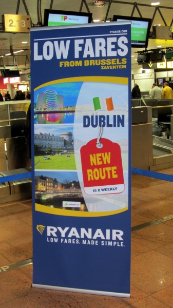 Advertisement for the new route at the Ryanair check-in counter (Row 2)