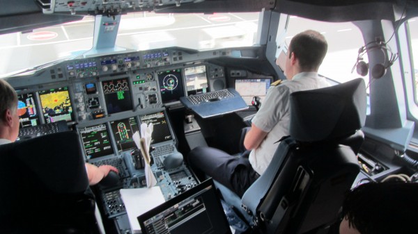 The cockpit with three pilots for longer trips