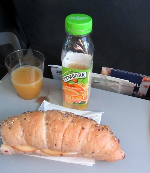 With an early departure, the buy-on-board breakfast was needed:  Polish smoked + regular cheese sandwich, orange juice
