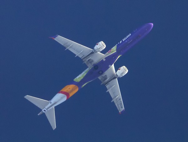 FLYBE ERJ-195 G-FBEM IN THE CANCER RESEARCH UK COLOURS.