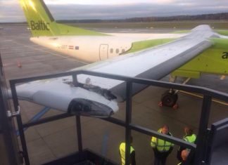 AirBaltic Bombardier Dash 8 Q400 clipped wings with jet bridge