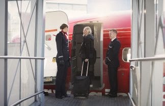Norwegian Airlines shuts bases in Stavanger and Trondheim amid cost-cutting measures, sparking employee protests