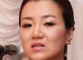 Korean Air Executive is being accused of assault after threw a cup of water at someone