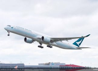 Passenger arrested for trying to open Cathay Pacific door mid-flight