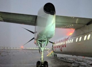 SpiceJet De Havilland Canada Dash 8-400 overruns runway during heavy rain at Surat Airport, India