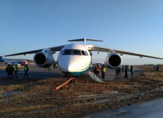 Angara Airlines Antonov An-148 gets stuck in soft ground after landing at Mirny Airport, Russia