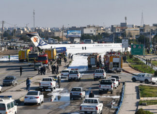 Caspian Airlines McDonnell Douglas MD-83 overshoots runway and ends up on highway