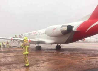 QantasLink Fokker 100 overruns runway at Newman Airport, Australia