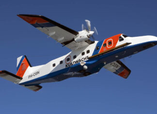 Netherlands Coast Guard Dornier 228 exits runway at Eindhoven Airport