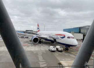 The Netherlands and Belgium (followed by other European countries) ban flights from UK to prevent spread of Covid-19 mutation British Airways at gate in Schiphol