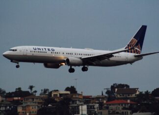 United Airlines passenger attempts to enter cockpit, open exit doors during takeoff