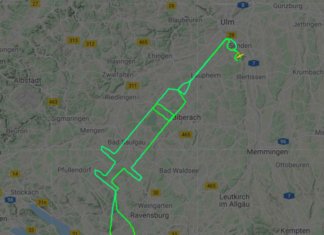 Pilot draws giant hypodermic needle in the sky to celebrate arrival of vaccine
