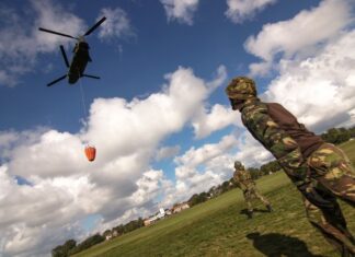 Dutch Chinook helicopters to the rescue to extinguish the forest fire in the Brecht (Belgium) nature reserve