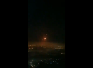 Passenger on flight from Brussels to Tel Aviv films rockets exploding above the city