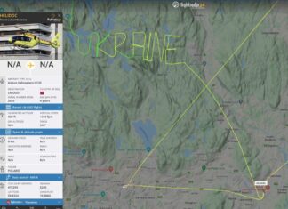 Norwegian air ambulance helicopter pilots draw “UKRAINE” sky marking