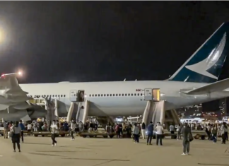 Cathay Pacific Boeing 777 aborts take-off; emergency evacuation initiated after overheated undercarriage