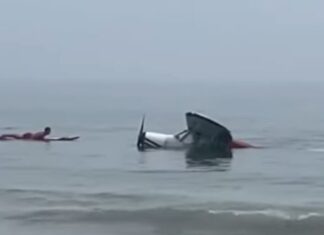 Small plane towing banner lands in the ocean off New Hampshire beach
