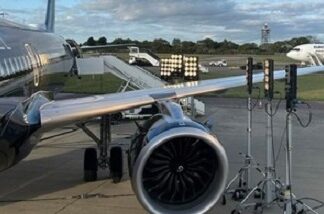 The windows of Titan Airways A321 were damaged by high power lights