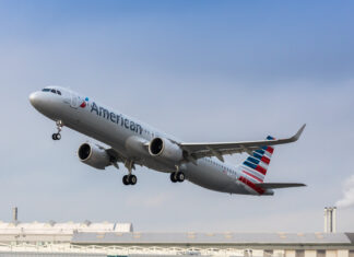 Passenger with bleeding head after hair transplant refuses to leave American Airlines flight