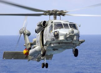 U.S. Navy searches for missing crew member after helicopter ditches in Arabian Sea